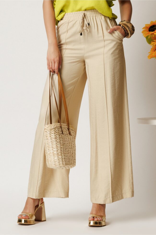 Pantaloni ivory din rayon cu croi lejer si elastic in talie